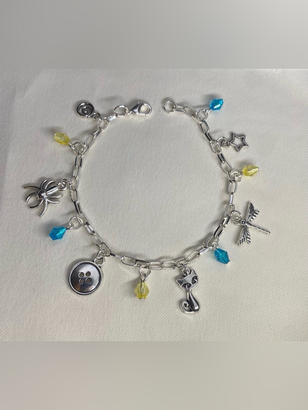 Handmade Silver Coraline Charm Bracelet